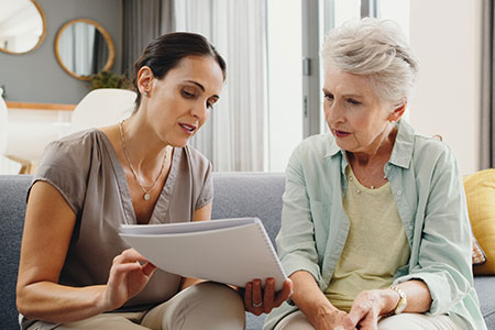 Nurse Speaking to Senior Woman of the In-Home Care Process